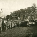 A communist funeral in the 1930s. No priests or incense but some large banners and an armed honour guard.