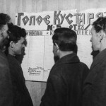 Interested workers peruse their workplace's wall paper in the 1930s (photograph by Leonid Shokin via Moscow House of Photography)