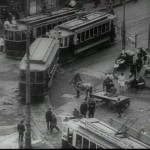 A horse and cart waits for trams to pass in 1930s Moscow.